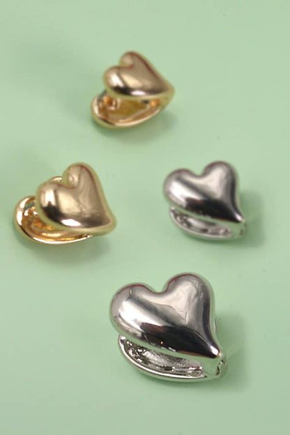 DOUBLE SIDED HIGH POLISHED HEART EAR HUGGIE | 10E40329032